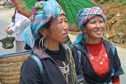 Wearing tribal head-dresses